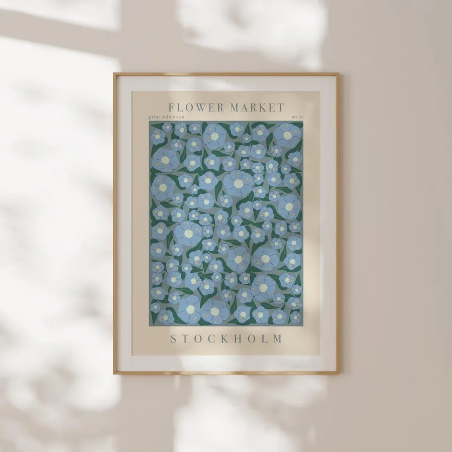 Stockholm Flower Market Print: Large blue flowers on teal green, shown framed on a wall